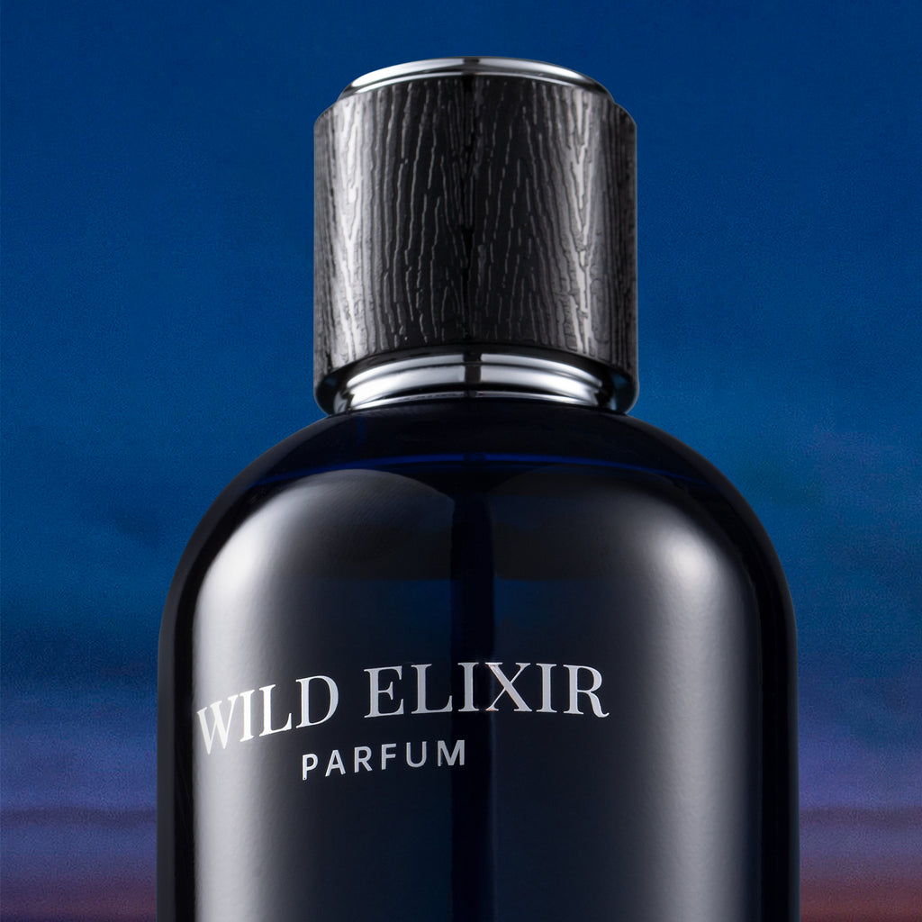 VLONIS WILD ELIXIR dark blue bottle close-up - intense concentrated men's perfume long lasting