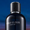VLONIS WILD ELIXIR dark blue bottle close-up - intense concentrated men's perfume long lasting